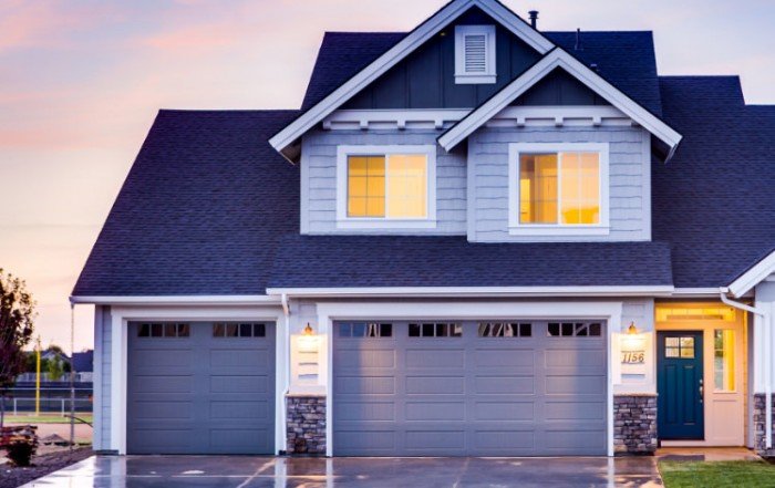blue house with a blue roof - top roofing company in Phoenix concept image